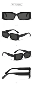 Detail view of black rectangular sunglasses featuring polished frames and dark grey lenses