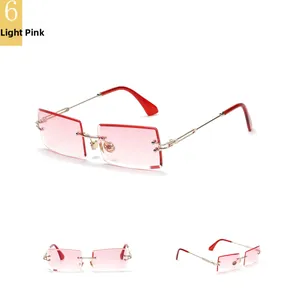 Detail view of light pink gradient rimless square sunglasses with gold metal temples