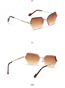 Détails des lunettes de soleil polygonales sans monture avec branches dorées