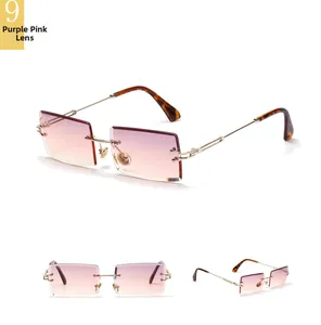 Close-up of rimless square sunglasses with purple-pink gradient lenses and gold metal temples