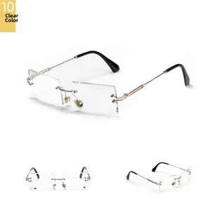 Detail view of square rimless glasses with gold metal bridge and transparent lenses