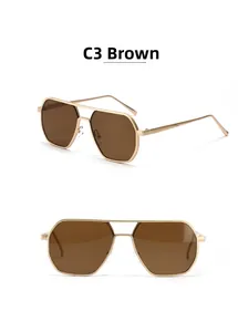 Detail view of gold metal double bridge aviator sunglasses with brown polygonal lenses