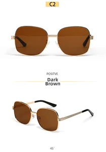 Front and 45-degree views of oval gold metal sunglasses with dark tea lenses