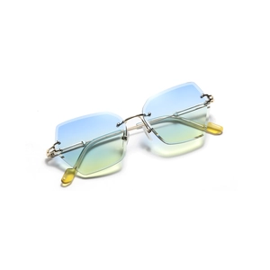 Lunettes de soleil hexagonales sans monture avec dégradé et monture en métal doré élégante