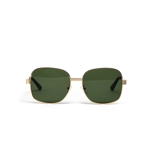 Fashionable oversized oval metal sunglasses with dark green lenses for women on white background
