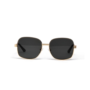 Oval oversized metal sunglasses with gold frame and black lenses in a modern chic style