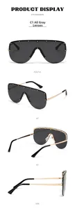 Detailed views of gray rimless sunglasses with gold rivets and metallic temples