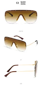 Close-up of model C3 rimless wrap-around sunglasses with tea gradient lenses and metal rivets