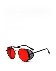 Detail view of steampunk metal frame sunglasses with red lenses and side mesh shields