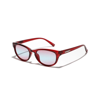 Lunettes de soleil œil de chat modernes avec monture rouge et verres dégradés rose