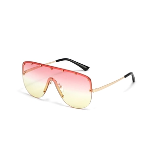 Frameless oversized shield sunglasses with pink gradient lenses and gold rivet studs