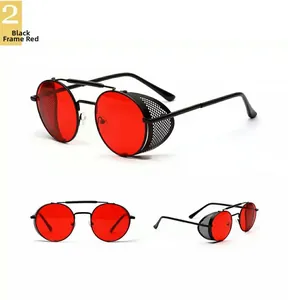 Detail of steampunk sunglasses with black metal frame and red lenses with mesh side shields