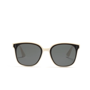 Fashionable square oversized sunglasses in ivory and black two-tone frame with gray lenses