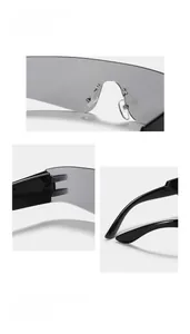 Detail of Y2K rimless sunglasses featuring grey lenses, metal nose pads and durable hinges