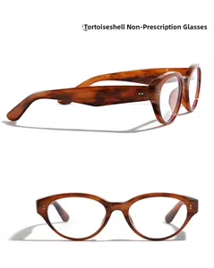 Detailed views of tortoiseshell cat-eye glasses showing frame texture and inner temple specs