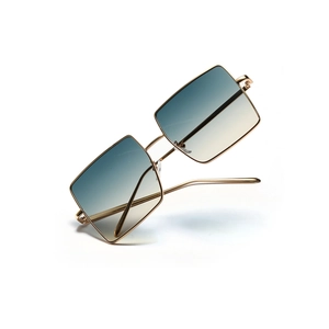 Oversized square metal sunglasses with gold frame and gradient blue-yellow lenses