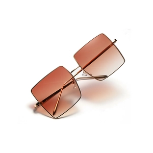 Oversized square metal sunglasses with gold frame and gradient brown lenses for women