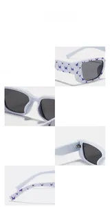 Detail view of Y2K narrow square sunglasses with purple butterfly patterns on white frames