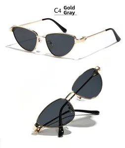 Détails des lunettes de soleil œil de chat géométriques gris doré avec monture fine