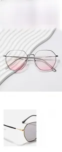 Close-up of polygon silver metal frame sunglasses with gradient pink lenses on white texture