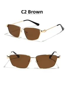 Detail view of square metal sunglasses with brown lenses and golden frames