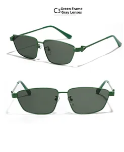 Detail view of square green metal sunglasses with gray lenses C3 model style