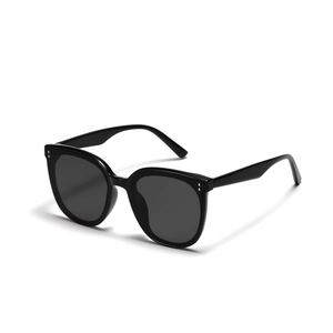 Classic large black frame sunglasses with polished finish and silver side dot accents