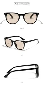 Detail view of retro square aviator sunglasses with black frame and light brown lenses