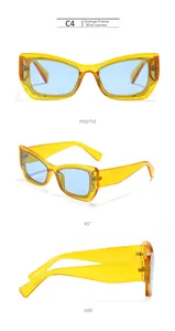 Detailed view of Y2K cat-eye sunglasses with transparent orange frames and blue lenses