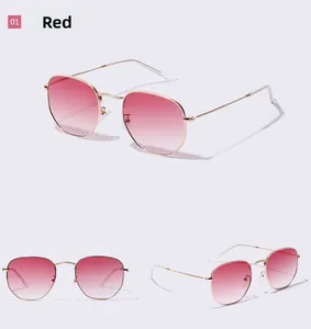Detail of trendy gold metal frames and red gradient hexagonal lenses for men's sunglasses