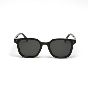 Classic black square frame sunglasses with silver rivet detail and dark lenses
