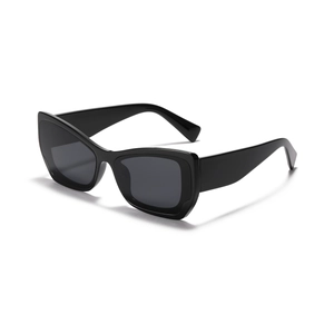 Modern Y2K black square sunglasses with thick glossy frames and dark grey lenses