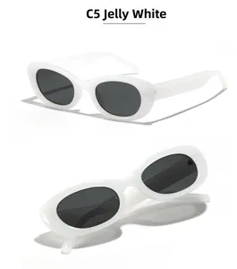 Detail view of oval jelly white frames and black lenses with 55-24-145 size specs