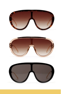 Three pairs of oversized shield sunglasses in tortoiseshell, pink, and black colors