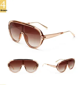 Three-angle view of oversized aviator sunglasses with brown gradient lenses and gold temples