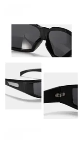 Makro-Detail der Nasenpads und des Metallscharniers der silbernen Y2K-Sonnenbrille