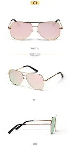 Detail view of gold aviator sunglasses with gradient lenses and specification markings