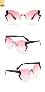 Detail of butterfly sunglasses with pink gradient lenses and lightning edge cutouts