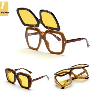 Macro view of double-layer flip-up sunglasses with yellow lenses and tortoise temples