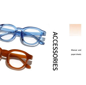 Détails de lunettes de soleil rondes vintage en bleu et ambre avec caractéristiques