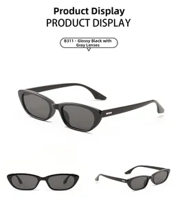 Detail view of model B311 retro cat eye sunglasses in glossy black frame and grey lenses
