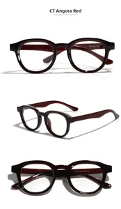 Vue en trois dimensions de montures de lunettes de soleil rondes rouge foncé rétro