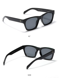Detail view of square black sunglasses with golden rivet accents and 45-degree angle shots