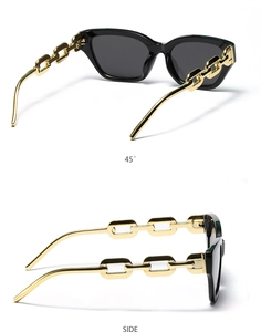 Detail view of black square sunglasses with decorative golden chain metal temples