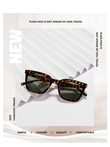 Détail de lunettes de soleil carrées œil-de-chat avec motif écaille de tortue marron