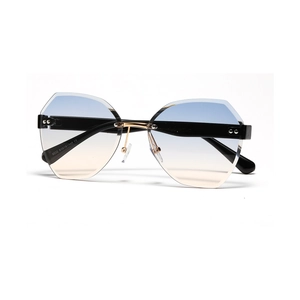 Frameless rimless polygon pink sunglasses for women with gradient lenses and gold metal trim