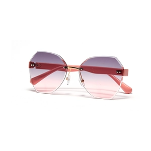 Retro rimless oversized sunglasses with pink gradient lenses and gold bridge for women