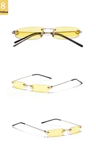 Drei Ansichten der randlosen ovalen Sonnenbrille mit gelben Gläsern und Goldmetallbügeln