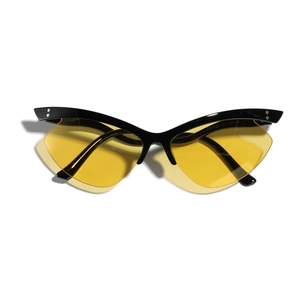 Frameless cat-eye sunglasses with black frame and yellow lenses for a retro butterfly look