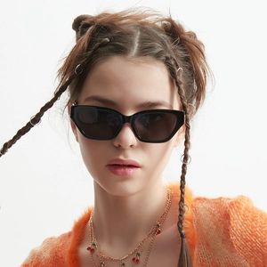 Classic black cat eye sunglasses for women with glossy frame and dark lenses